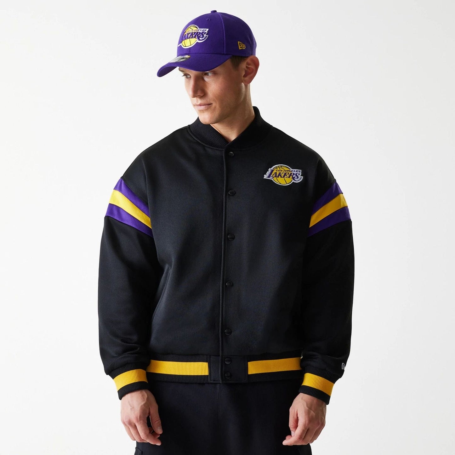 The Male model is wearing LA Lakers NBA Panel Black Bomber Jacket 1