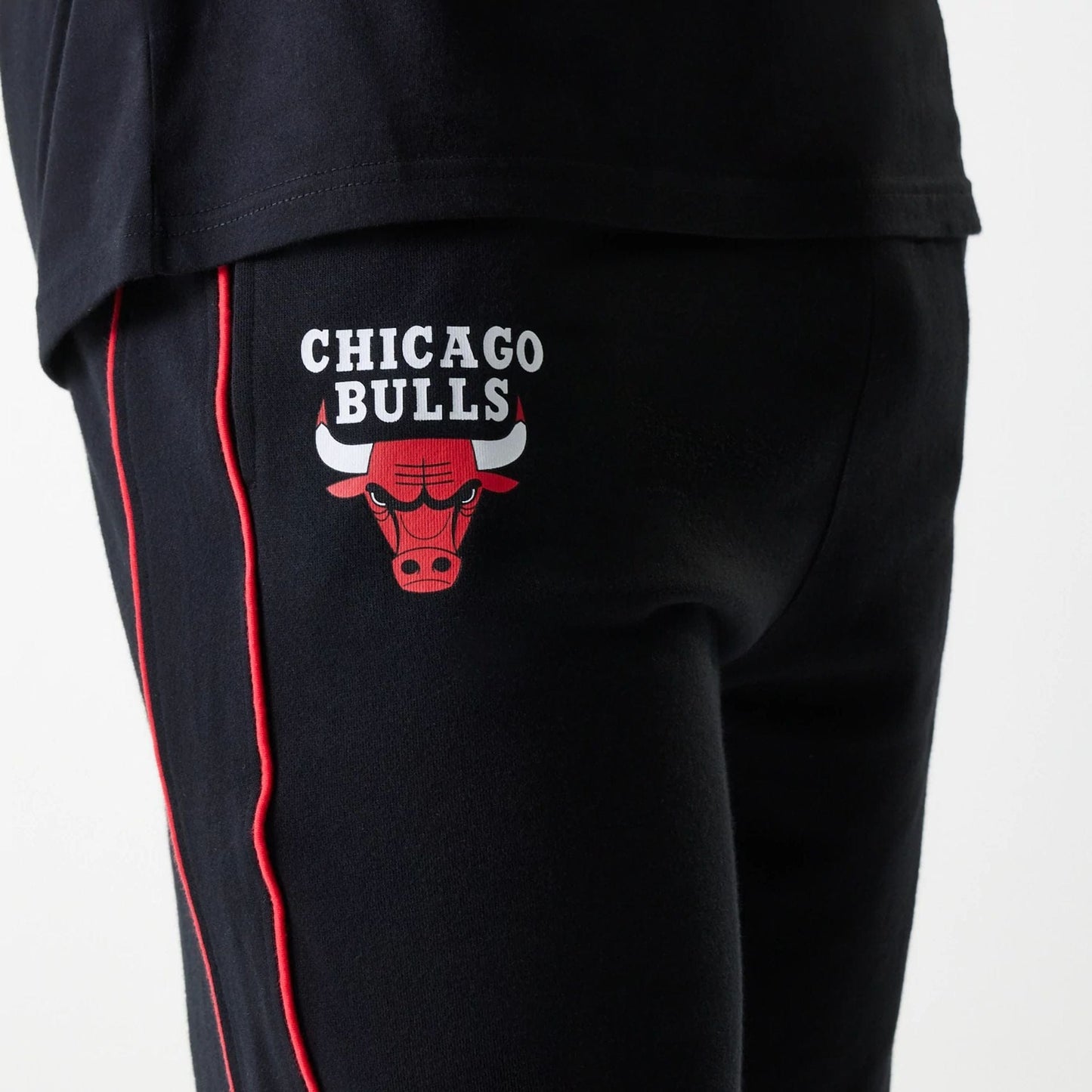 The Male model is wearing Chicago Bulls NBA Piping Black Shorts 3