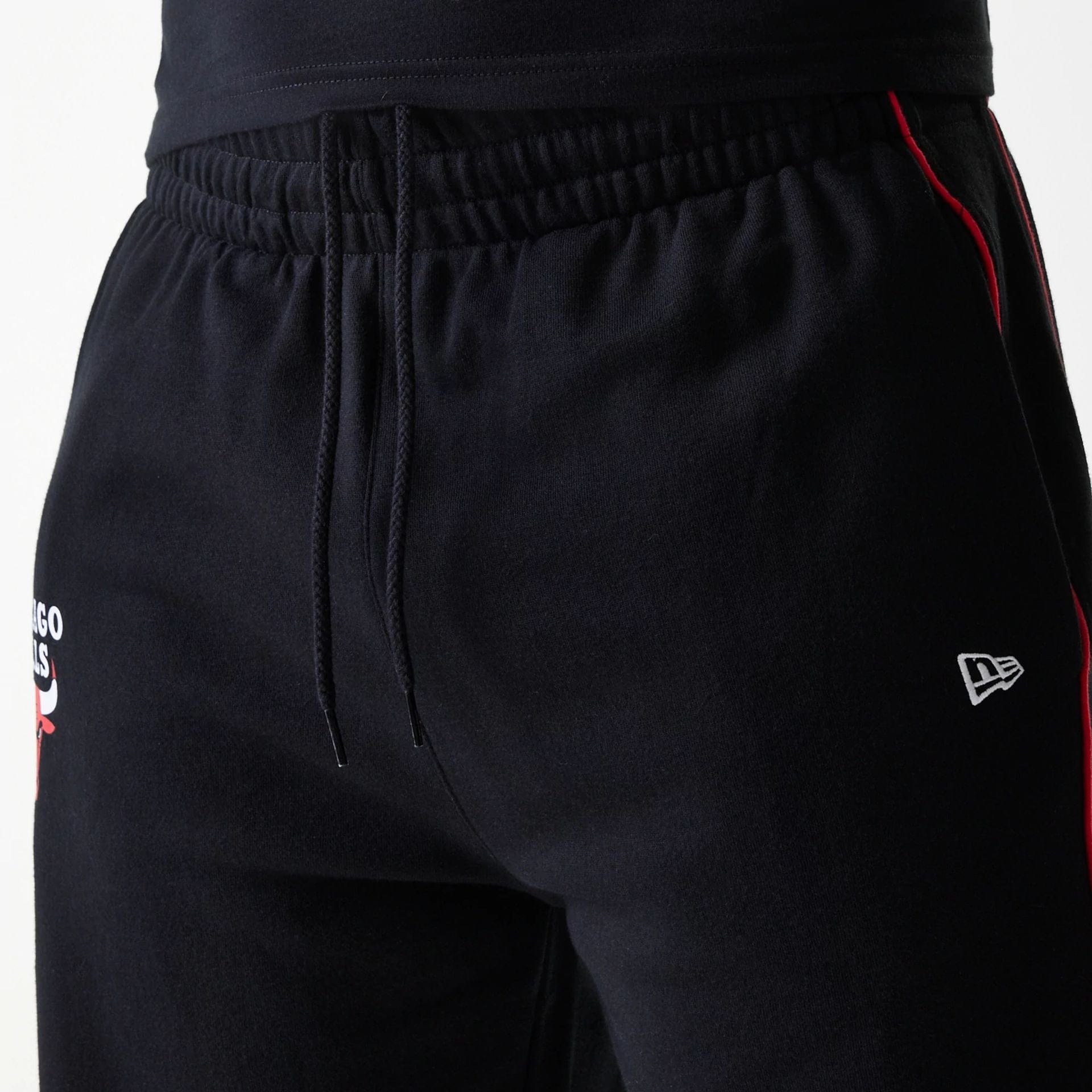 The Male model is wearing Chicago Bulls NBA Piping Black Shorts 5