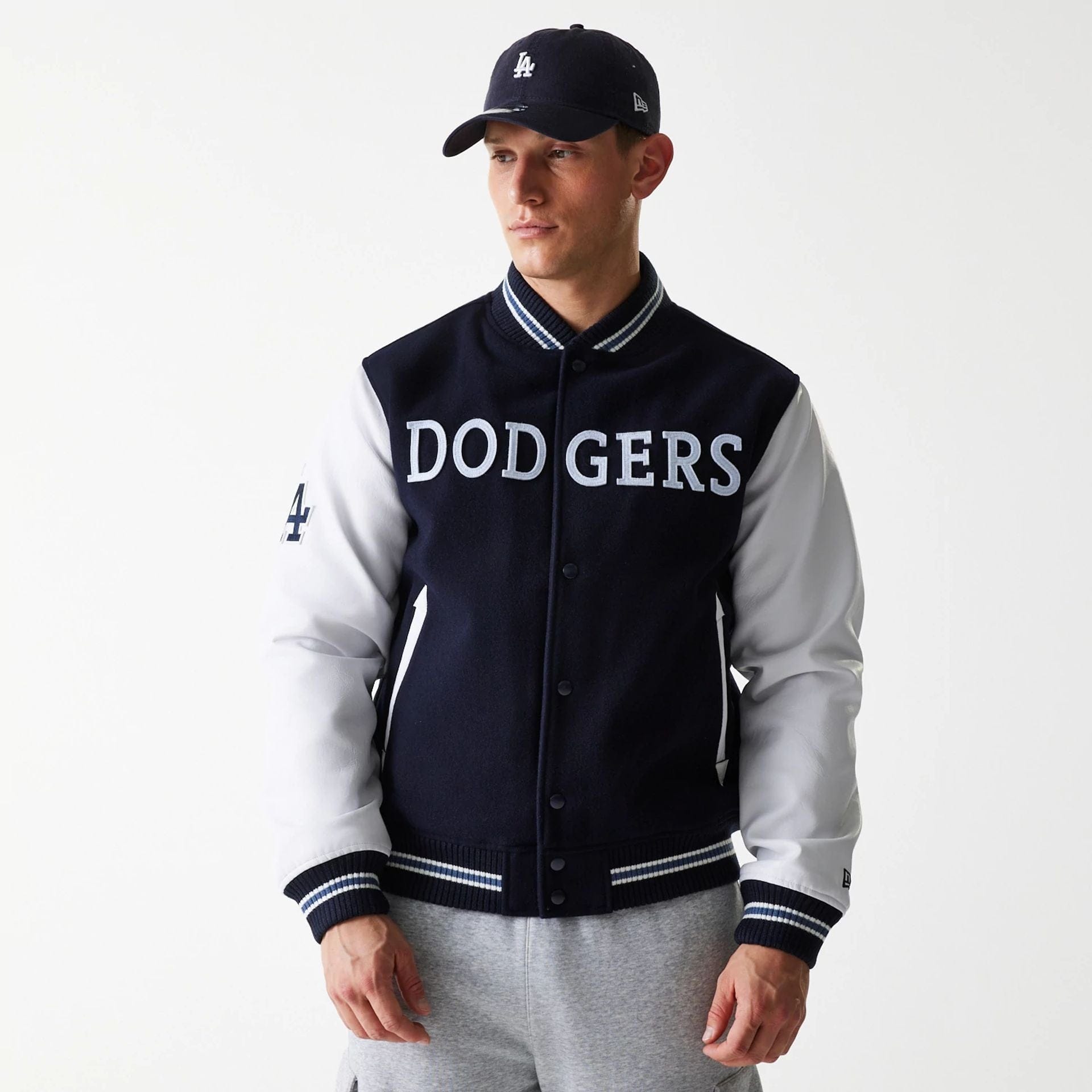 The Male model is wearing LA Dodgers MLB Wordmark Navy Varsity Jacket 1
