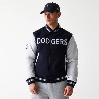 The Male model is wearing LA Dodgers MLB Wordmark Navy Varsity Jacket 1