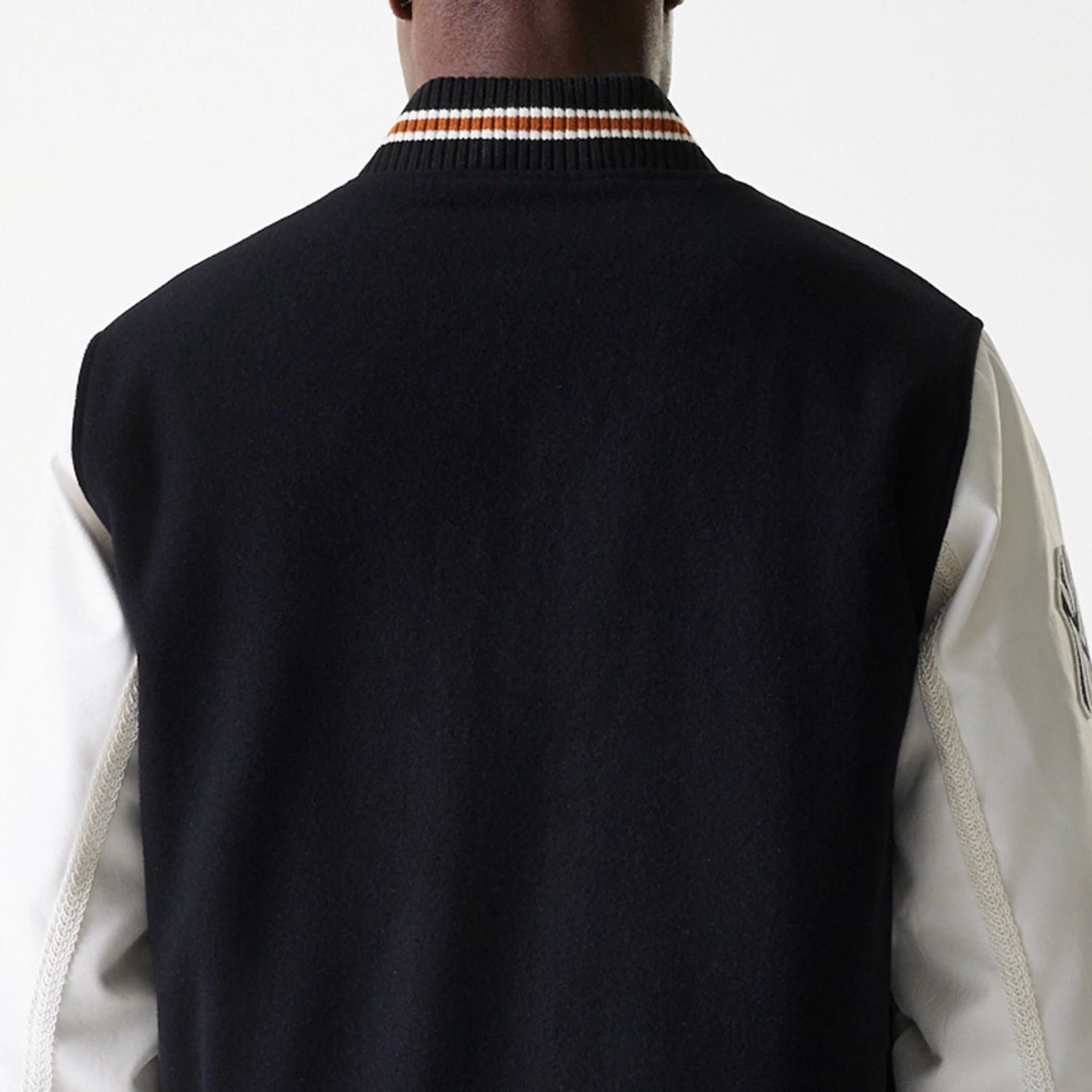 The Male model is wearing New York Yankees MLB Wordmark Black Varsity Jacket 7