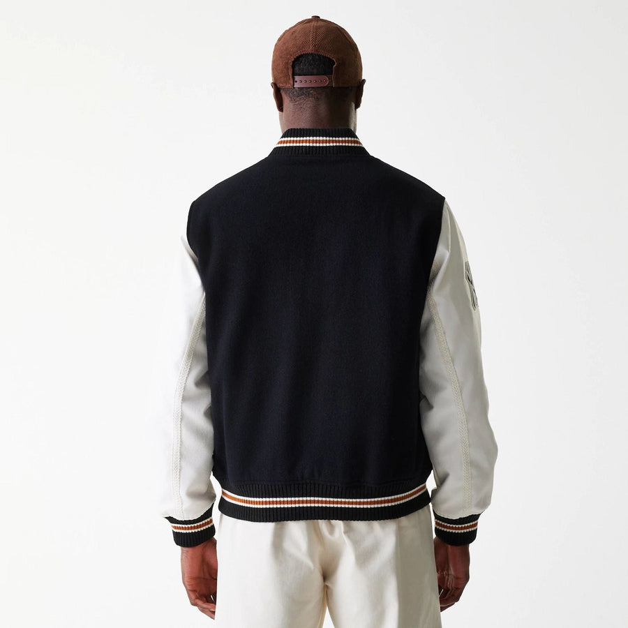 The Male model is wearing New York Yankees MLB Wordmark Black Varsity Jacket 2