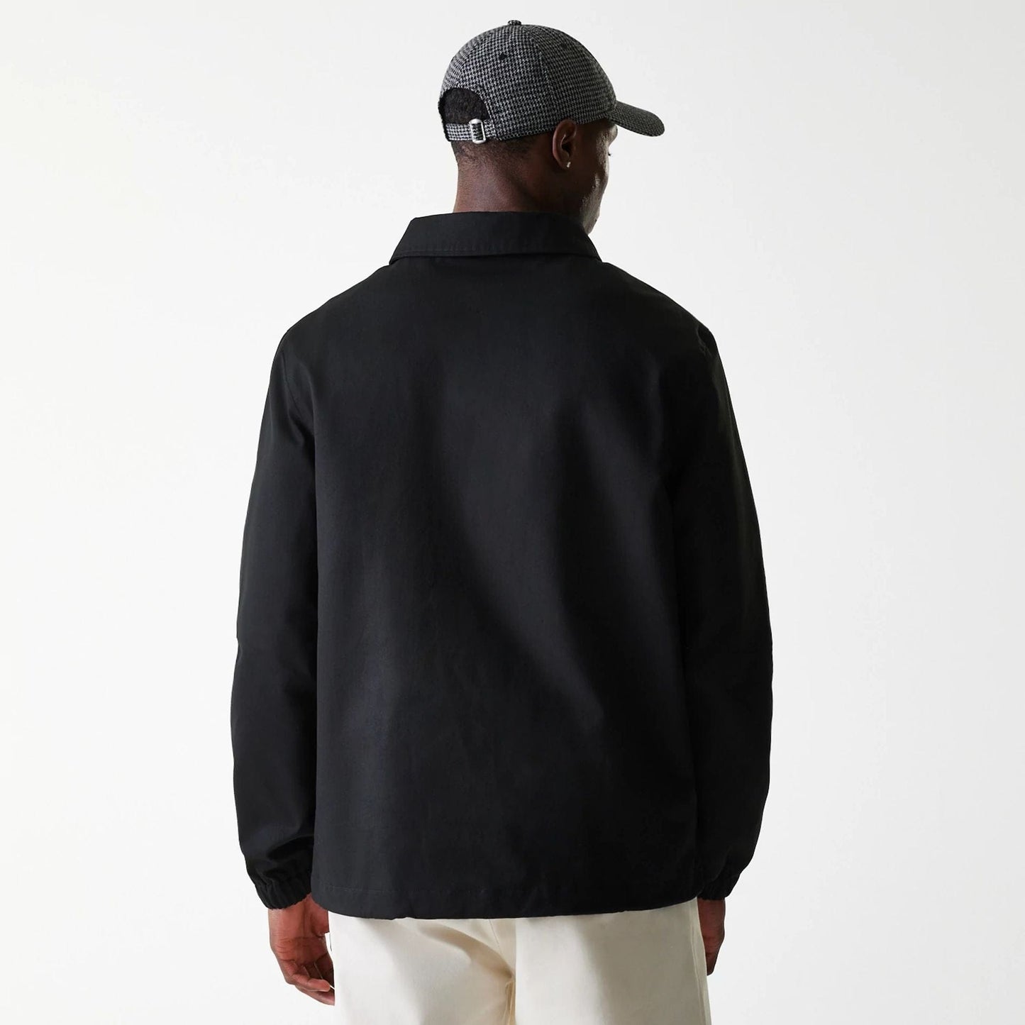The Male model is wearing New York Yankees MLB Twill Black Coaches Jacket 2