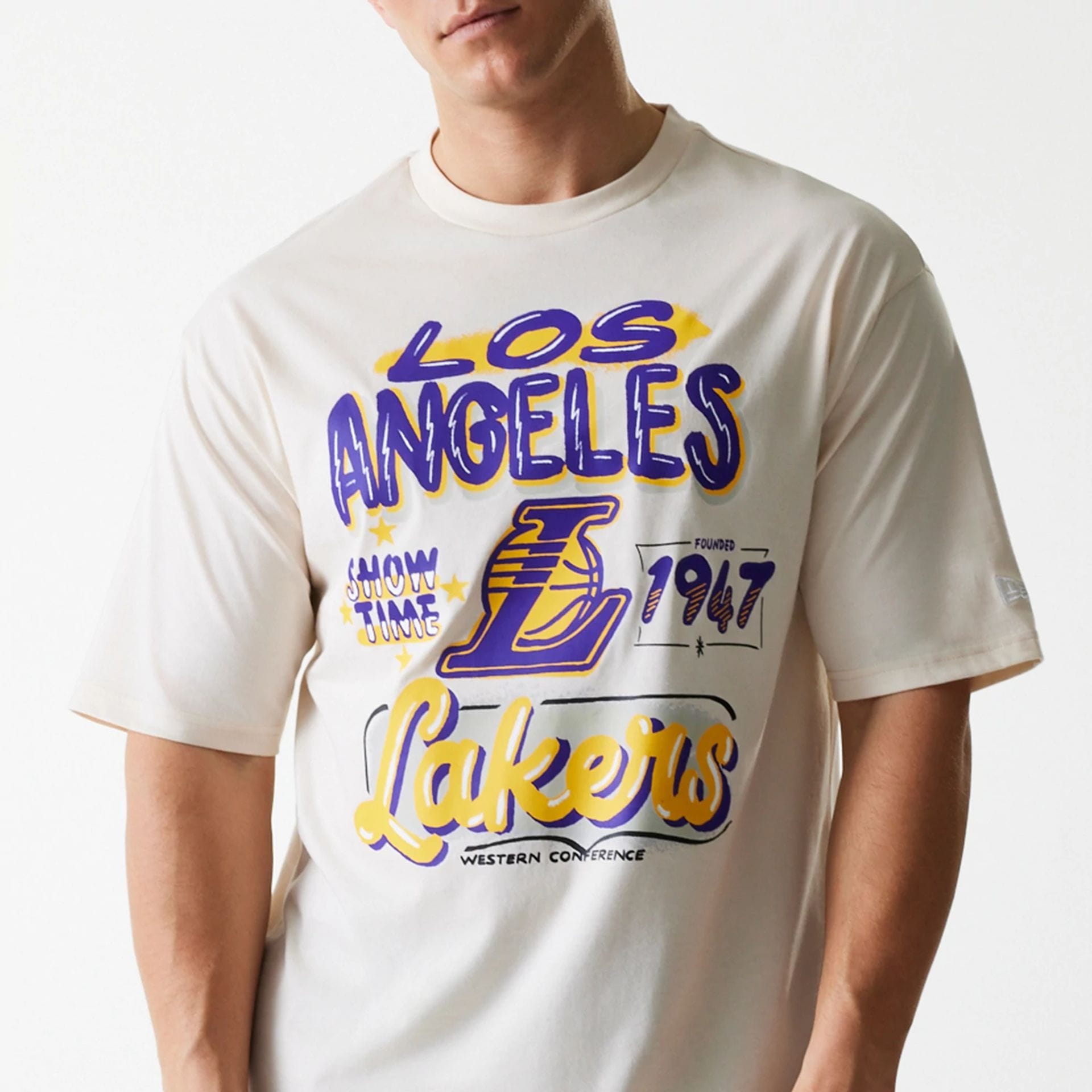 The Male model is wearing LA Lakers NBA Graphic Light Beige Oversized T-Shirt 3
