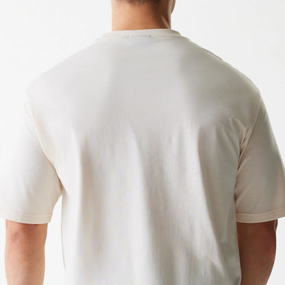 The Male model is wearing LA Lakers NBA Graphic Light Beige Oversized T-Shirt 7