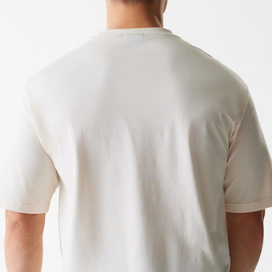 The Male model is wearing LA Lakers NBA Graphic Light Beige Oversized T-Shirt 7