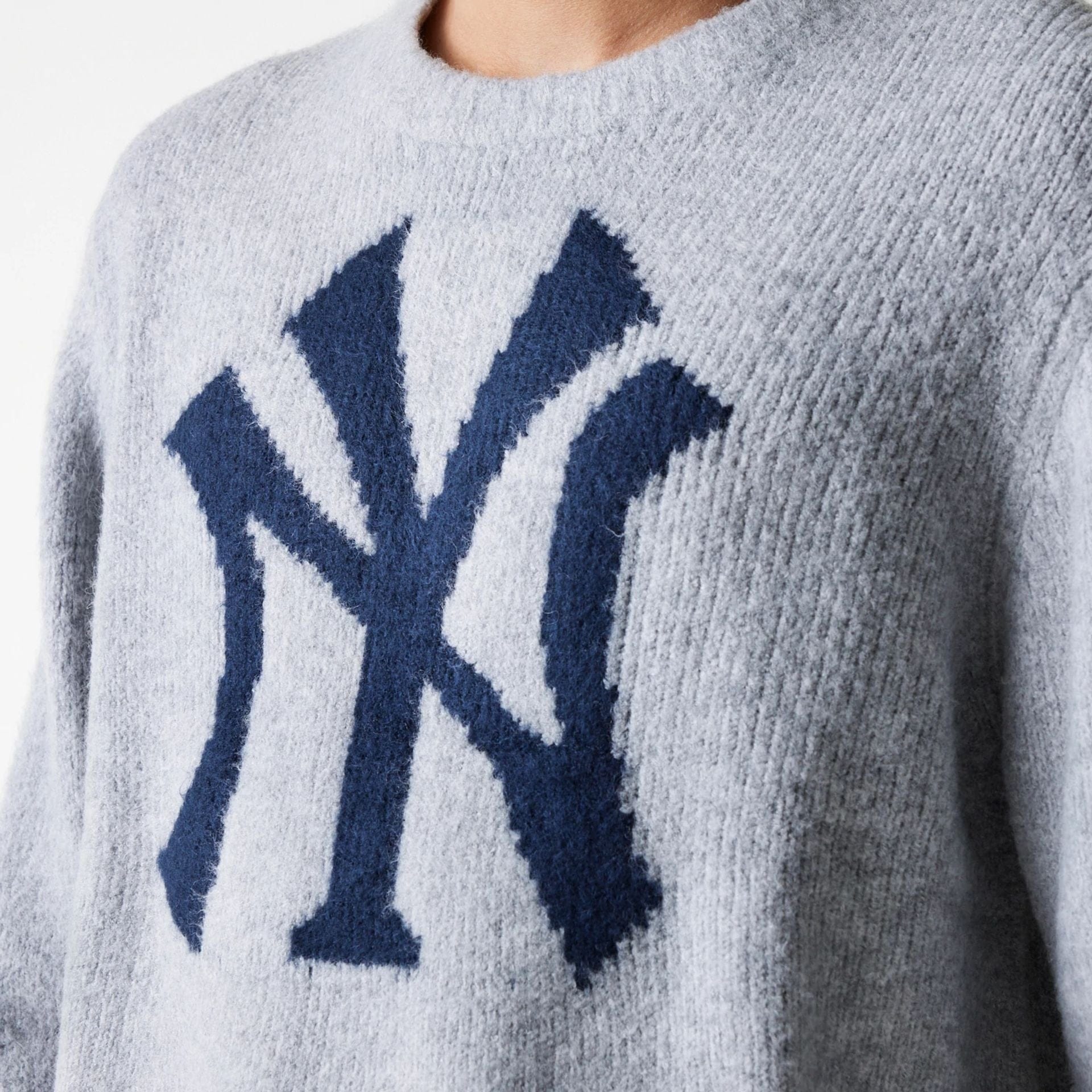 The Male model is wearing New York Yankees MLB Knit Grey Oversized Knit Sweater 6