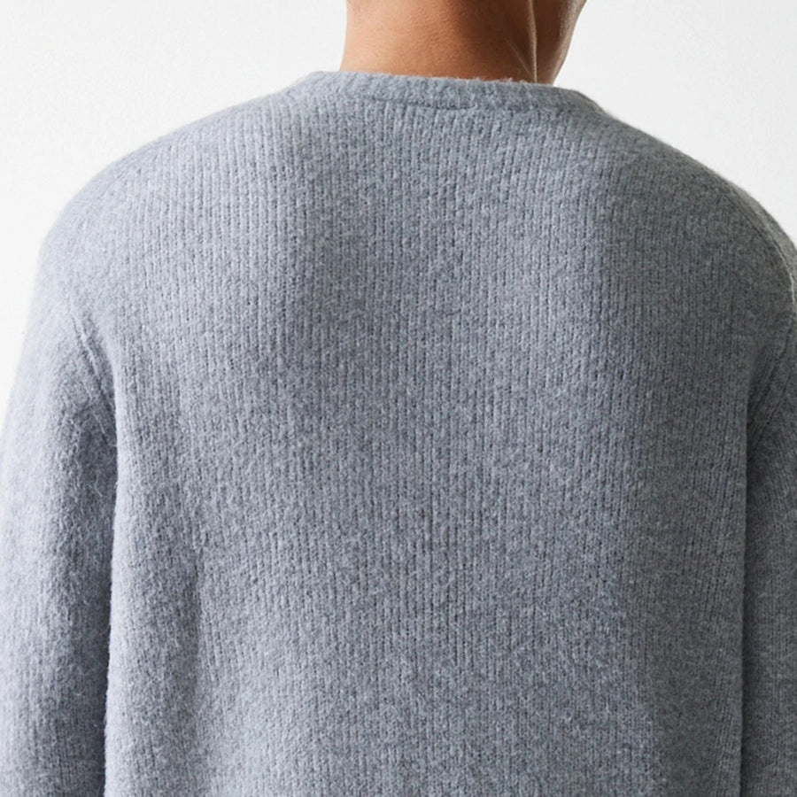 The Male model is wearing New York Yankees MLB Knit Grey Oversized Knit Sweater 8