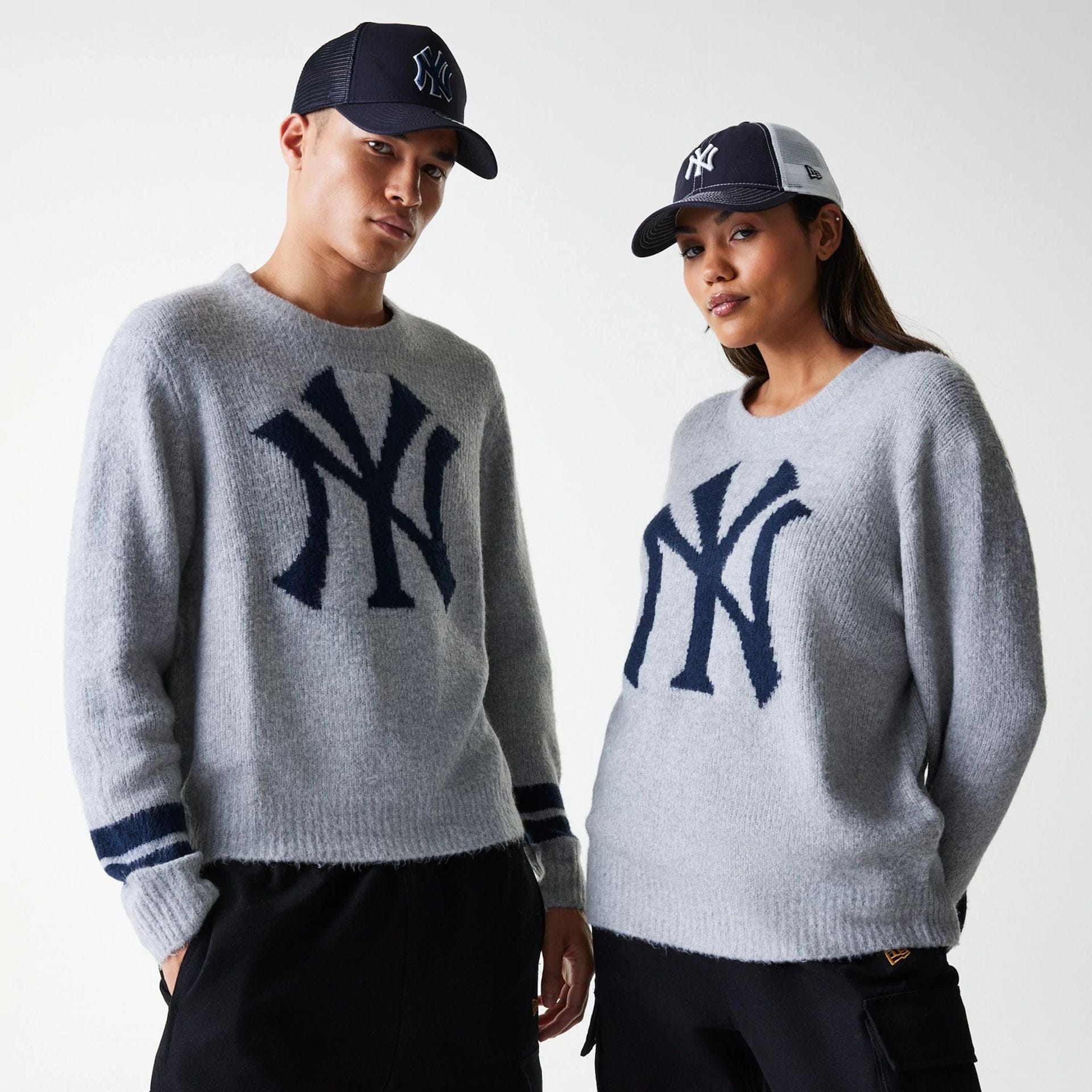 The Male model is wearing New York Yankees MLB Knit Grey Oversized Knit Sweater 1