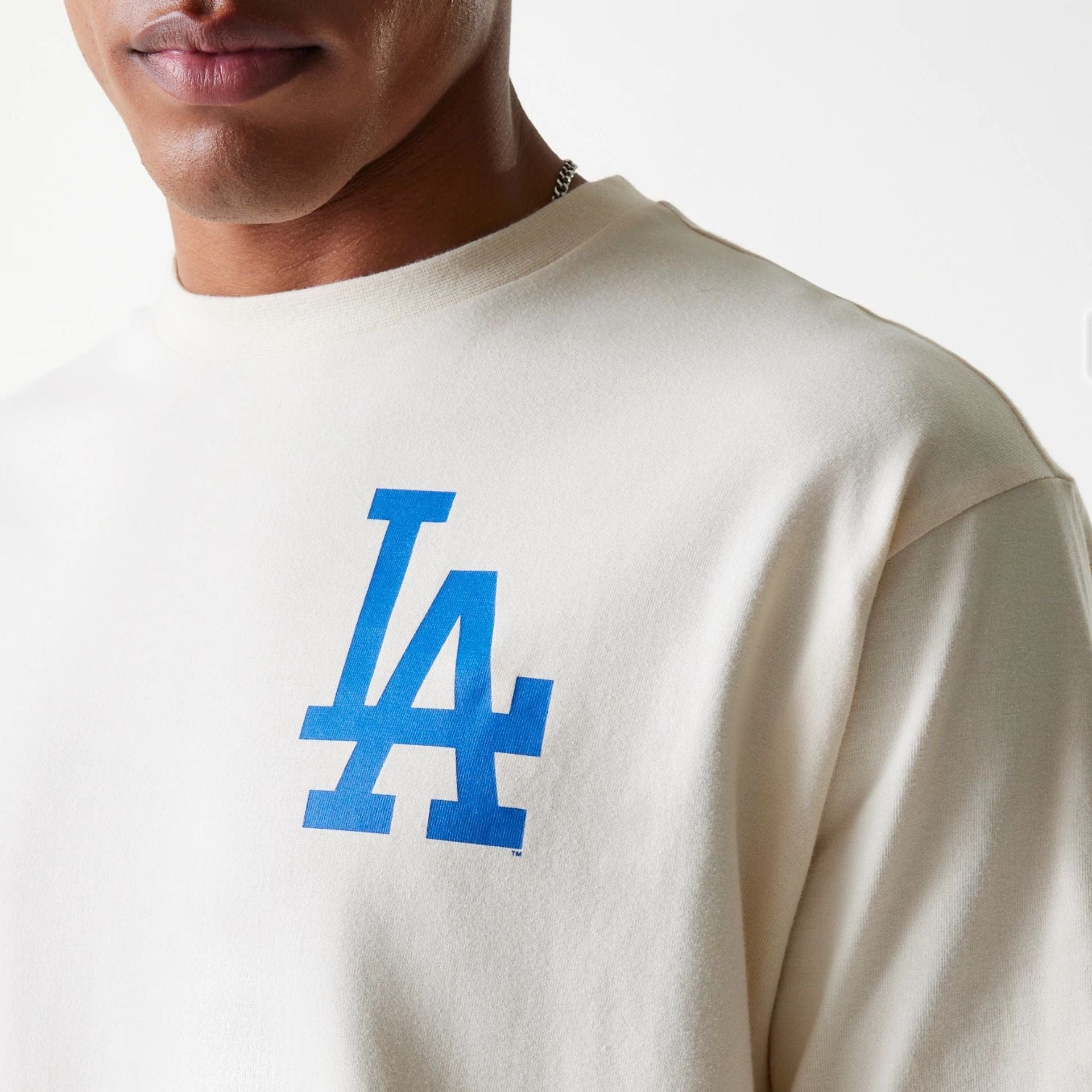 The Male model is wearing LA Dodgers MLB Baseball Graphic Light Beige Oversized T-Shirt 6