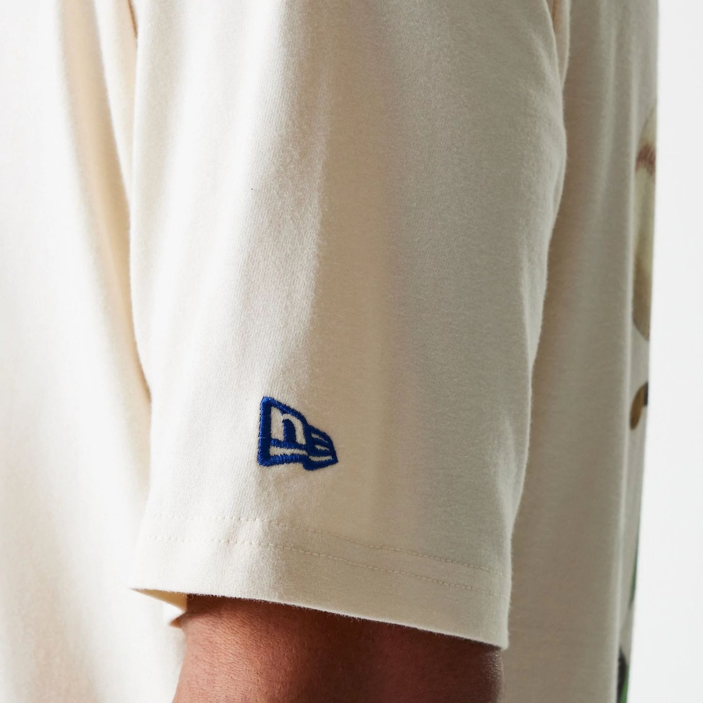 The Male model is wearing LA Dodgers MLB Baseball Graphic Light Beige Oversized T-Shirt 7