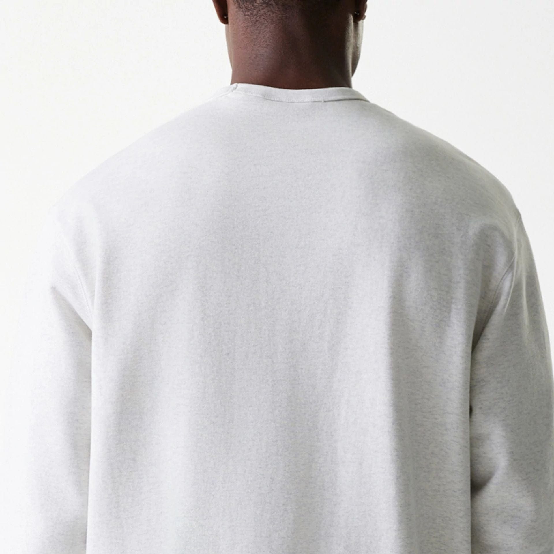 The Male model is wearing LA Dodgers MLB Heritage Pastel Grey Oversized Crew Neck Sweater 7