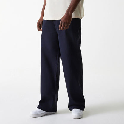 The Male model is wearing LA Dodgers MLB Navy Chino Trousers 3