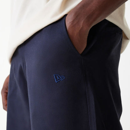 The Male model is wearing LA Dodgers MLB Navy Chino Trousers 6
