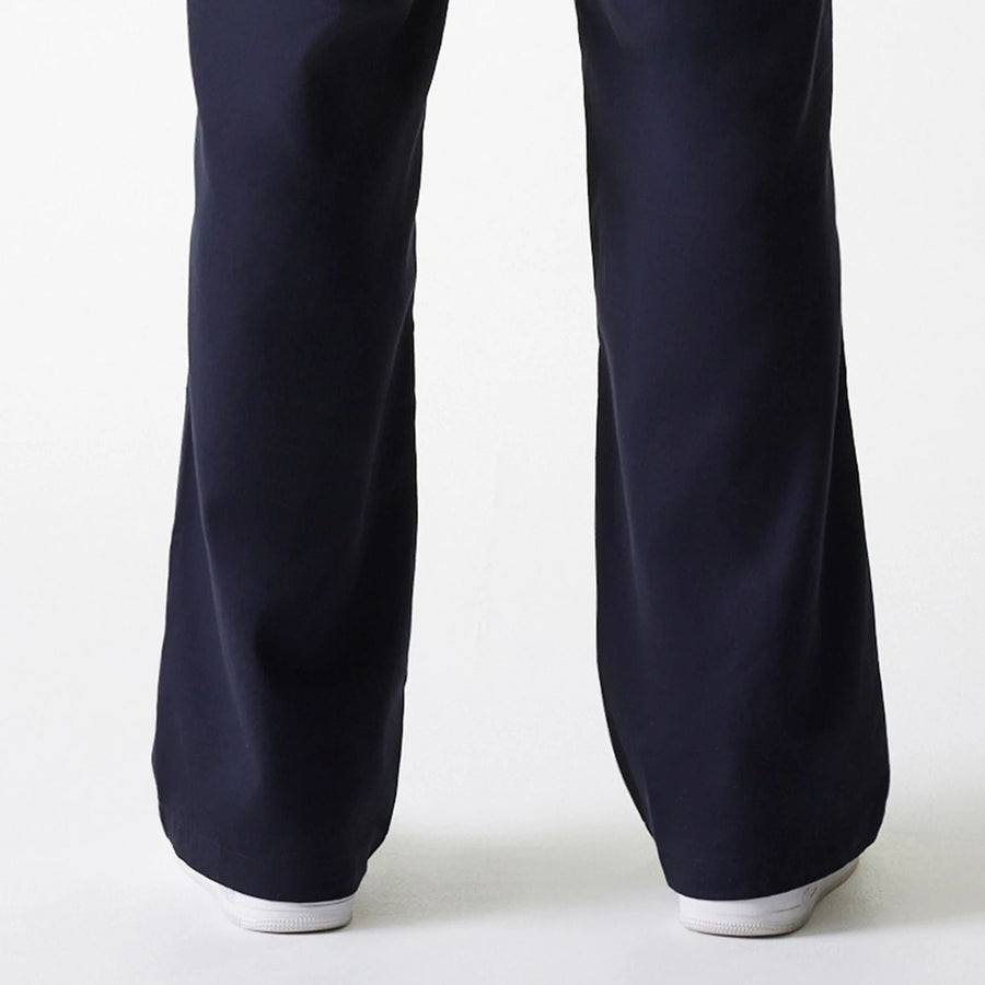 The Male model is wearing LA Dodgers MLB Navy Chino Trousers 7