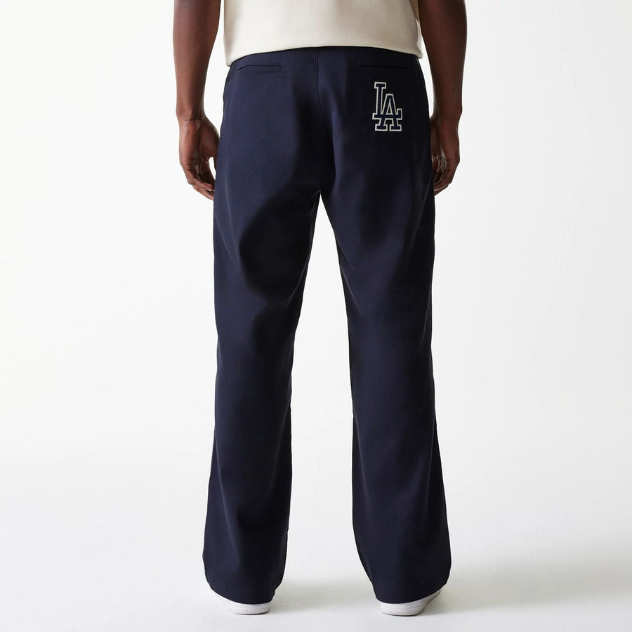 The Male model is wearing LA Dodgers MLB Navy Chino Trousers 2