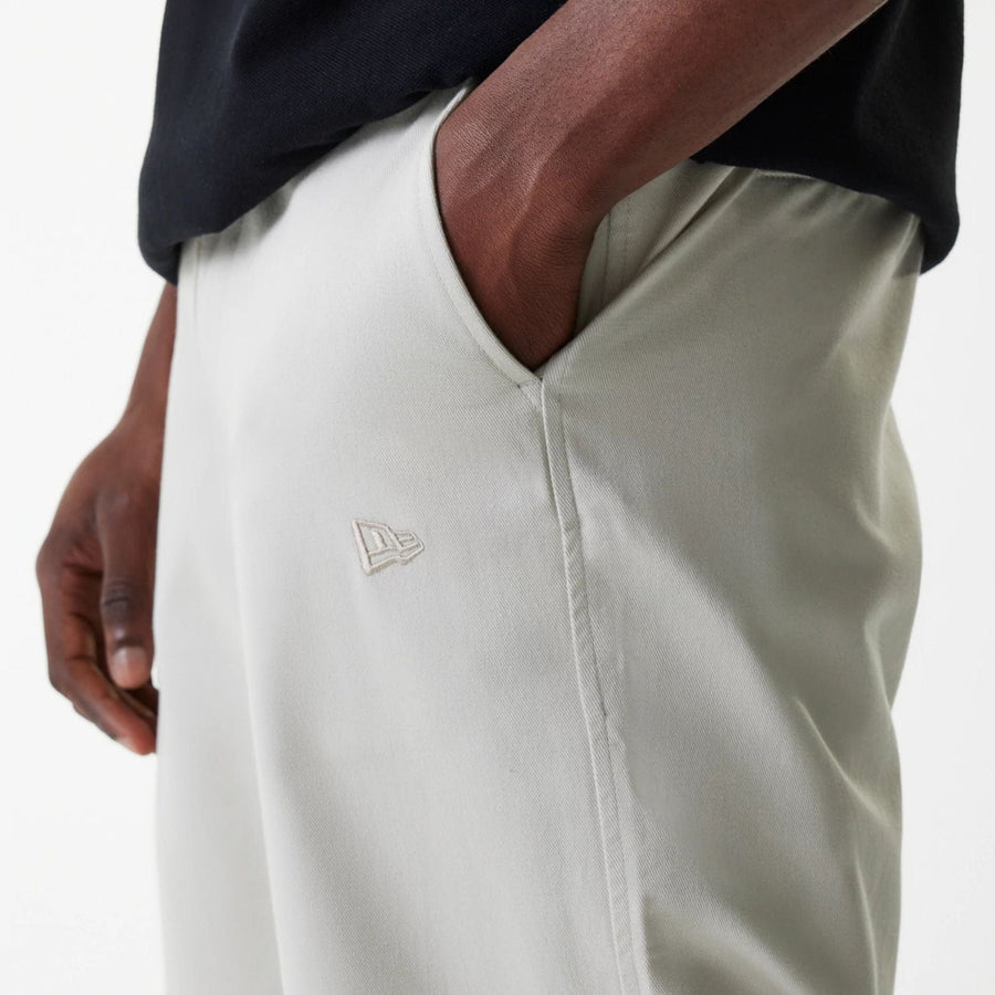 The Male model is wearing New York Yankees MLB Light Beige Chino Trousers 5