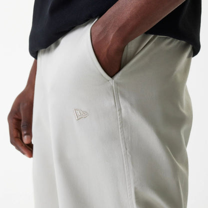 The Male model is wearing New York Yankees MLB Light Beige Chino Trousers 5