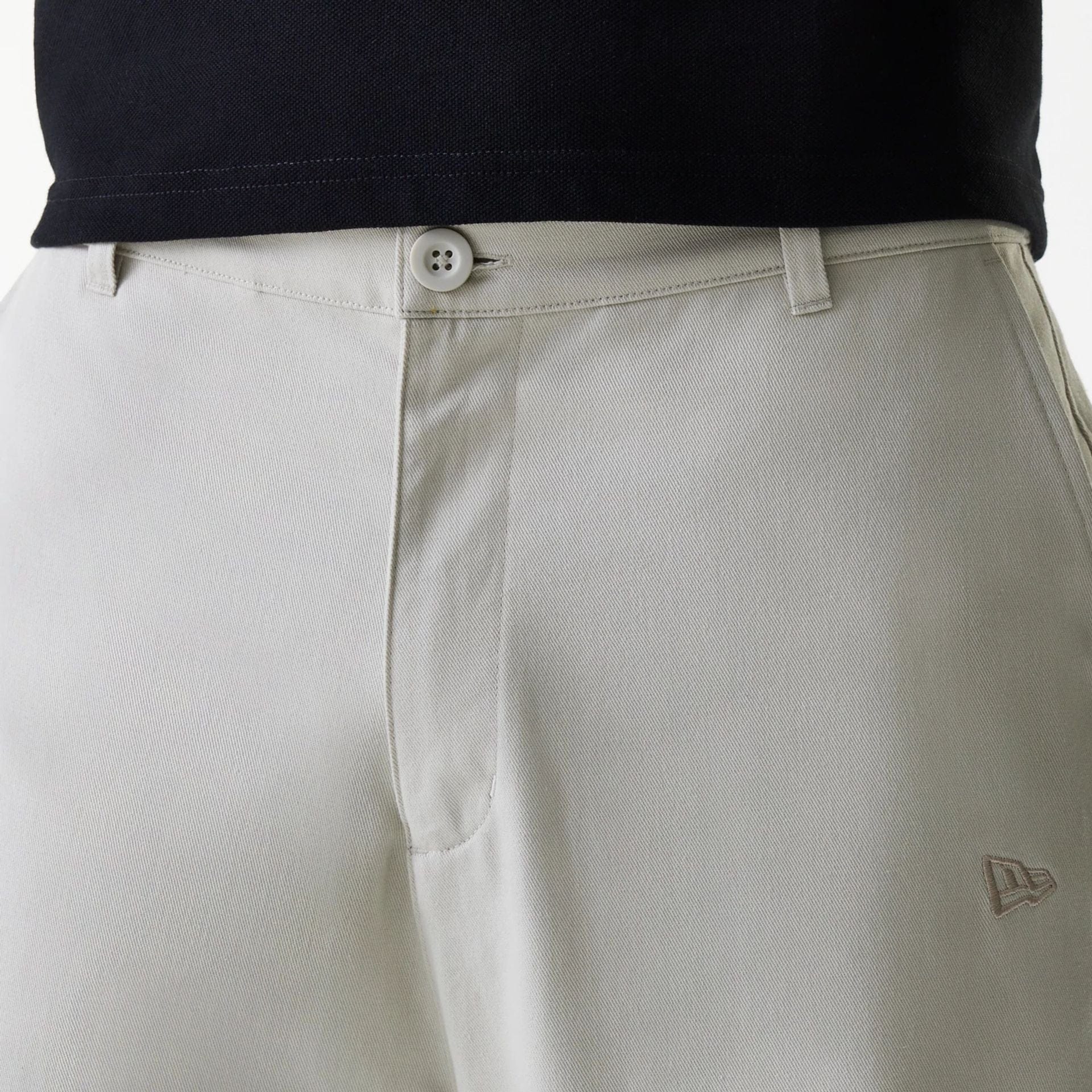 The Male model is wearing New York Yankees MLB Light Beige Chino Trousers 6