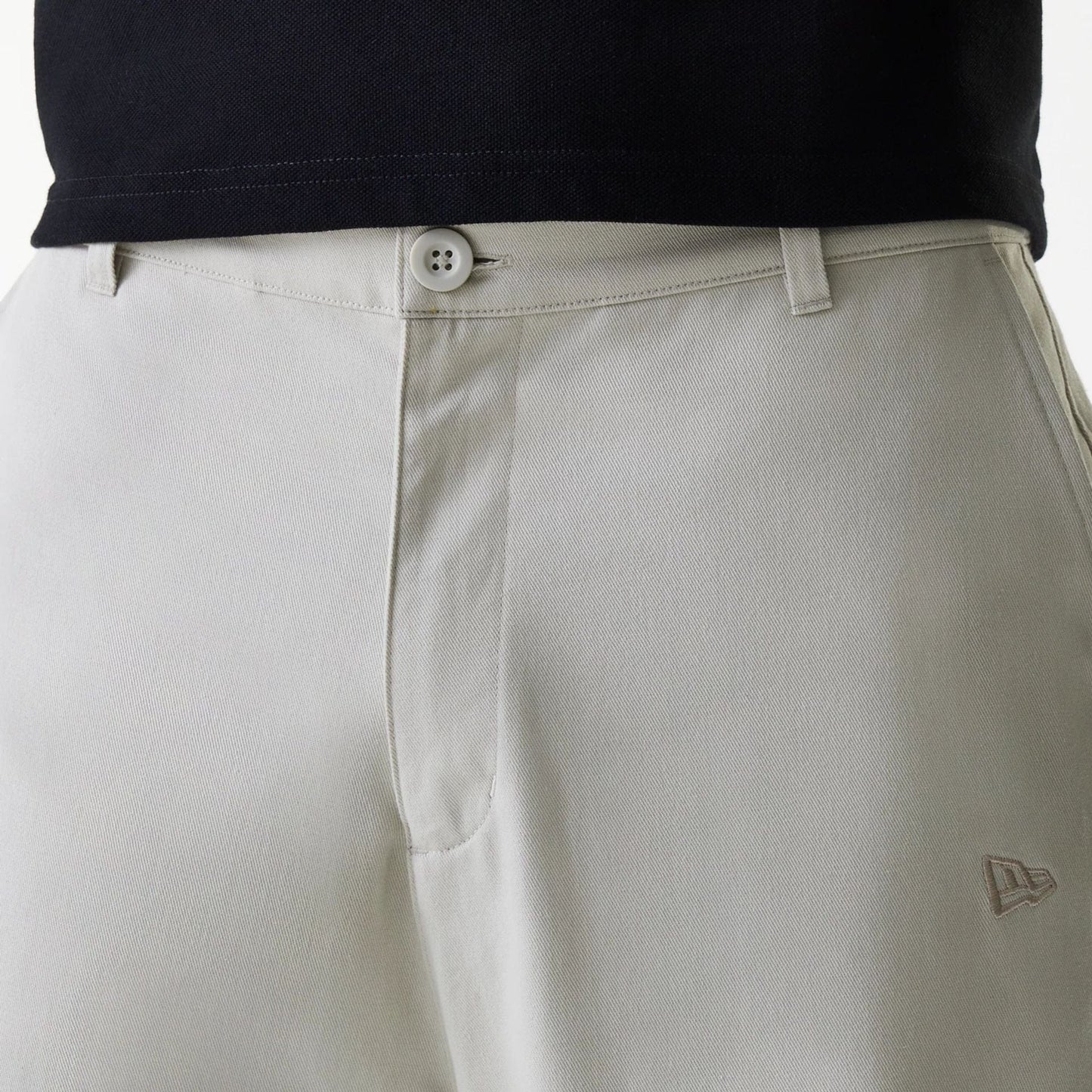 The Male model is wearing New York Yankees MLB Light Beige Chino Trousers 6