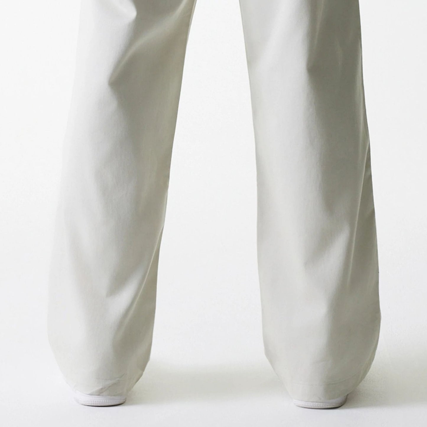 The Male model is wearing New York Yankees MLB Light Beige Chino Trousers 7