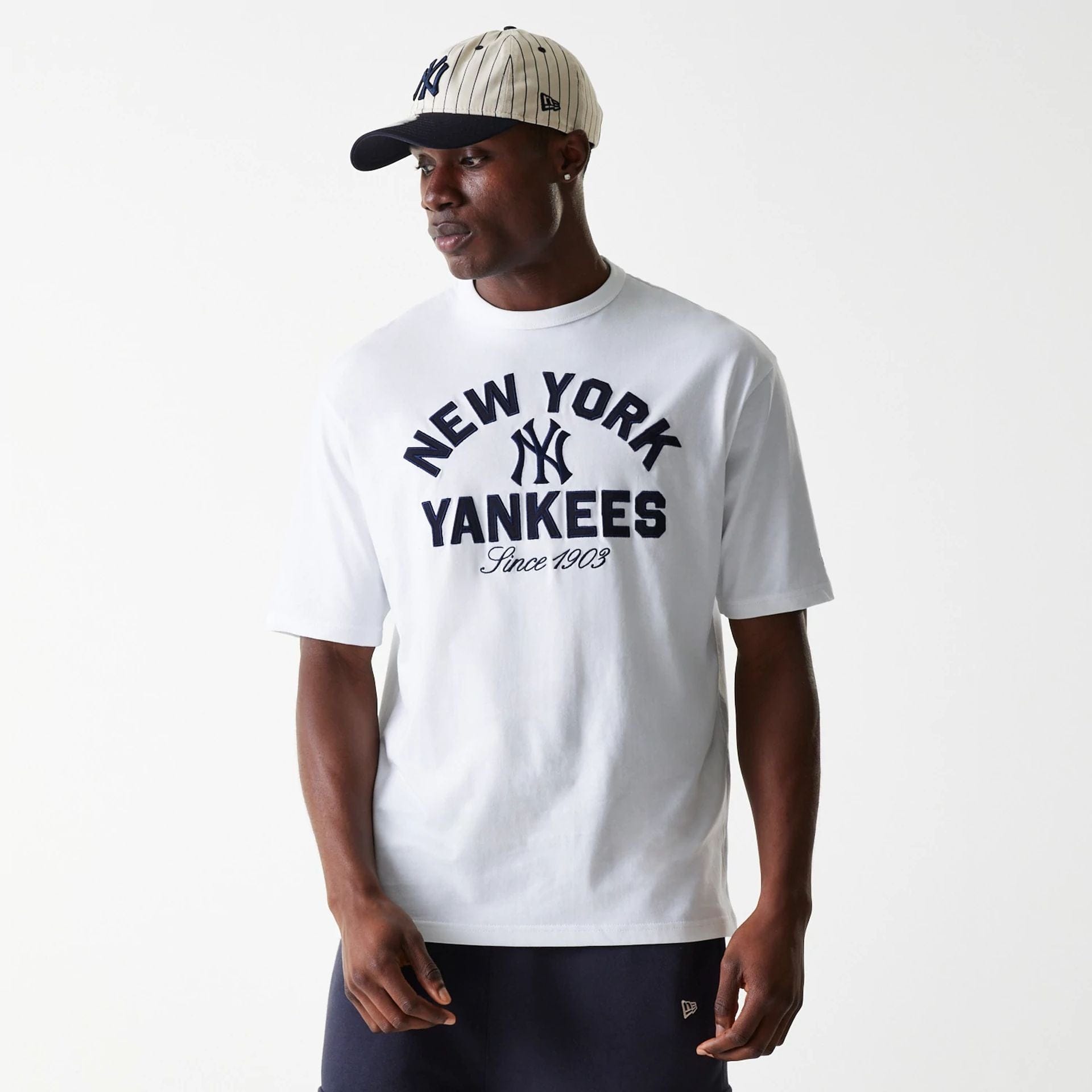 The Male model is wearing New York Yankees MLB Heritage White Oversized T-Shirt 1