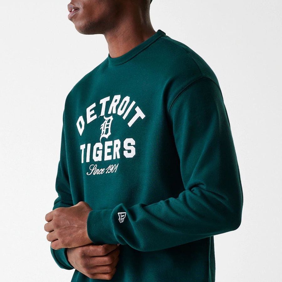 The Male model is wearing Detroit Tigers MLB Heritage Dark Green Oversized Crew Neck Sweater 5