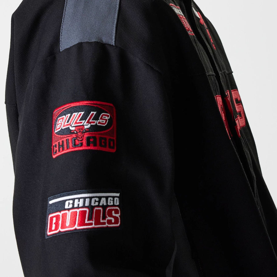 The Male model is wearing Chicago Bulls NBA Motorsport Black Motorsports Jacket 4