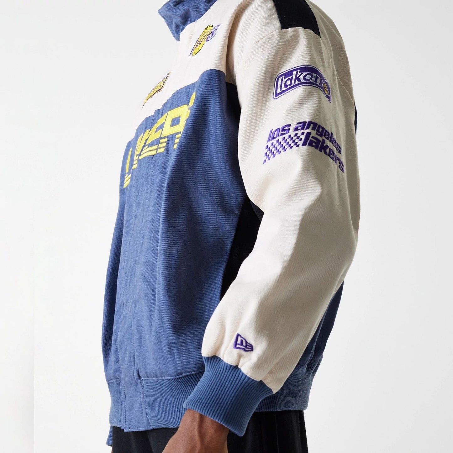 The Male model is wearing LA Lakers NBA Motorsport Dark Blue Motorsports Jacket 7