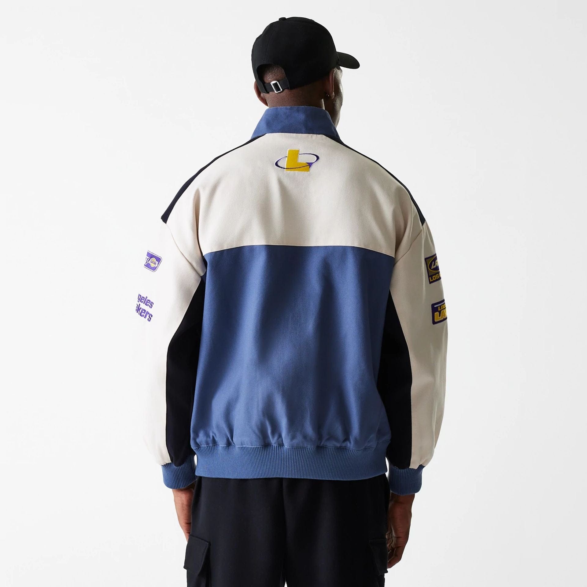The Male model is wearing LA Lakers NBA Motorsport Dark Blue Motorsports Jacket 2