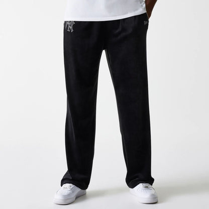 The Male model is wearing New York Yankees MLB Velour Black Track Pants 5
