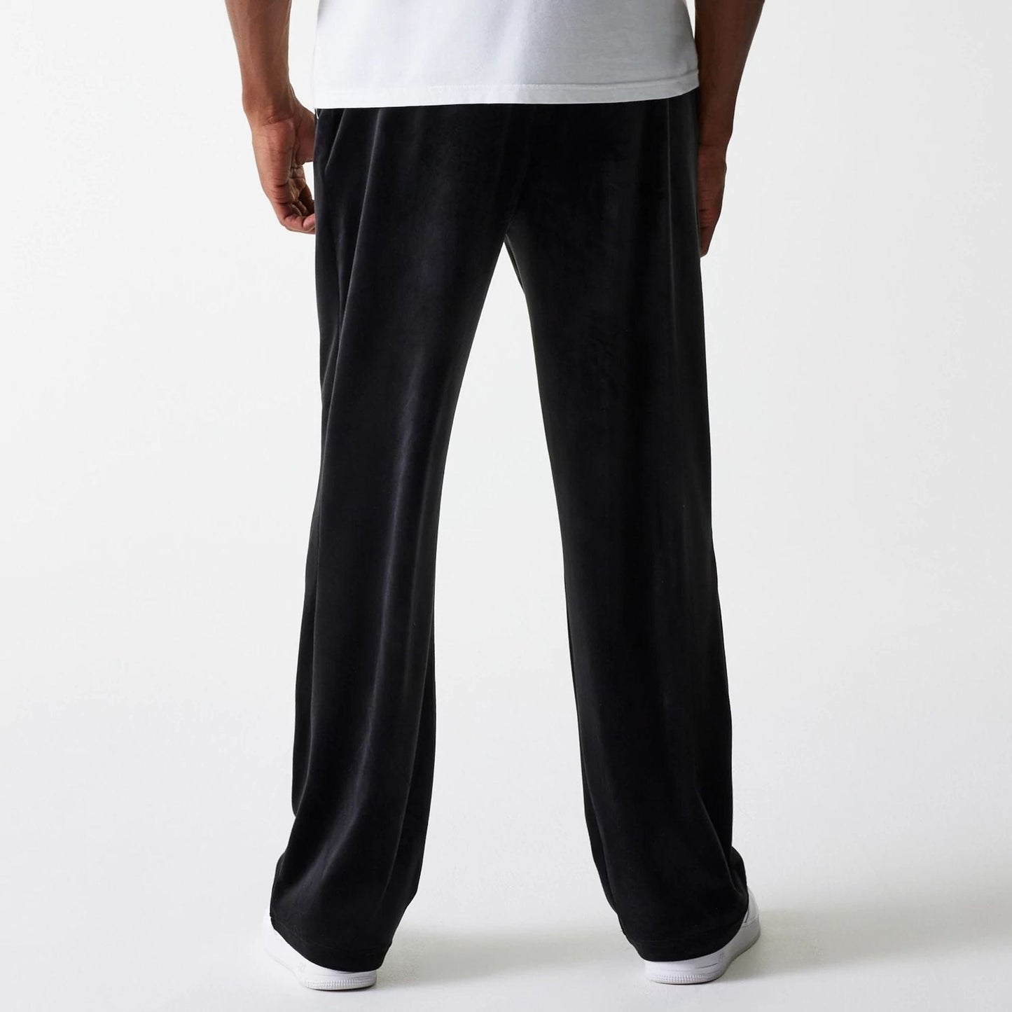 The Male model is wearing New York Yankees MLB Velour Black Track Pants 2