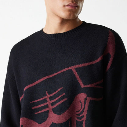 The Male model is wearing Chicago Bulls NBA Knit Black Oversized Knit Sweater 5