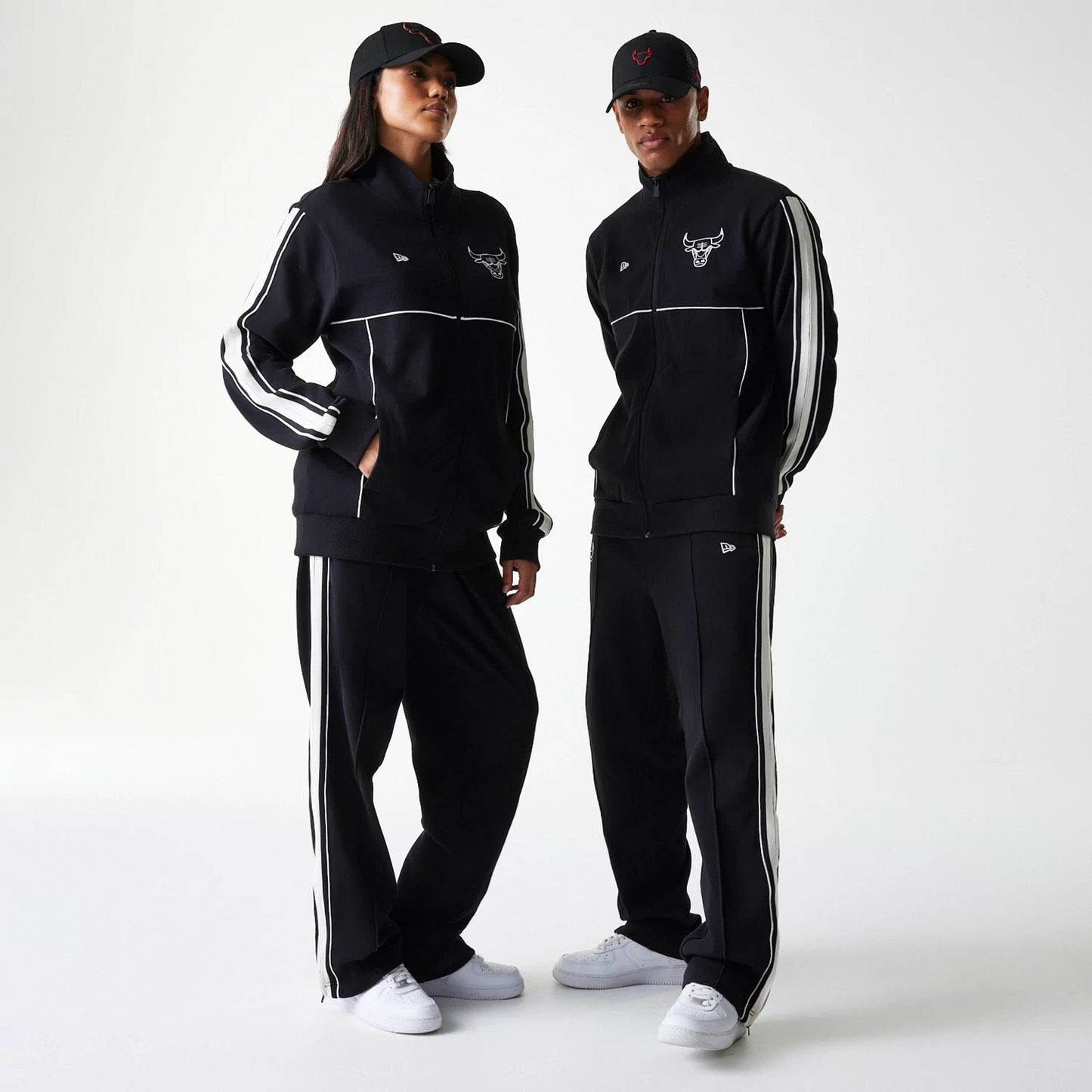 The Male model is wearing Chicago Bulls NBA Outline Black Track Jacket 1