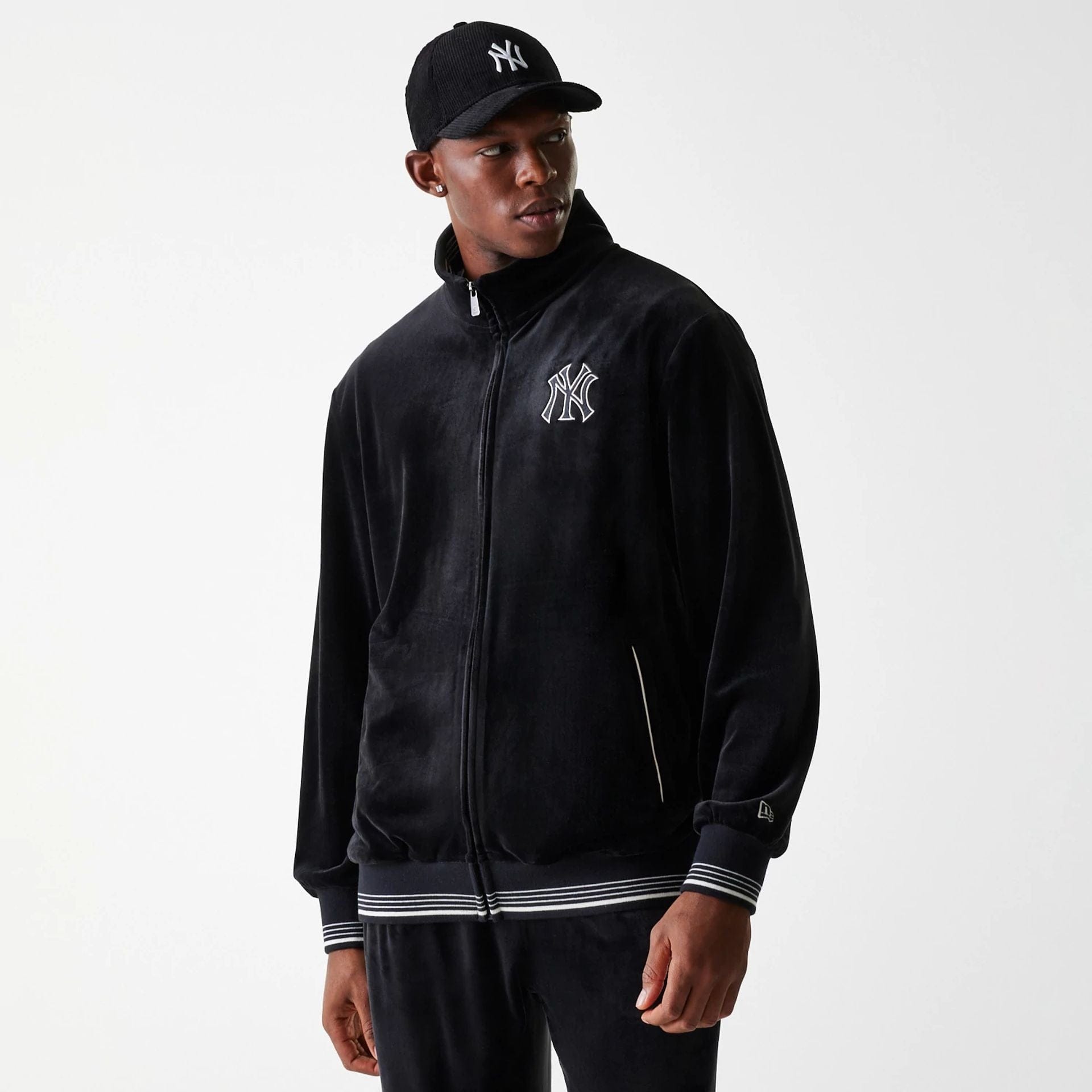 The Male model is wearing New York Yankees MLB Velour Black Track Top 3