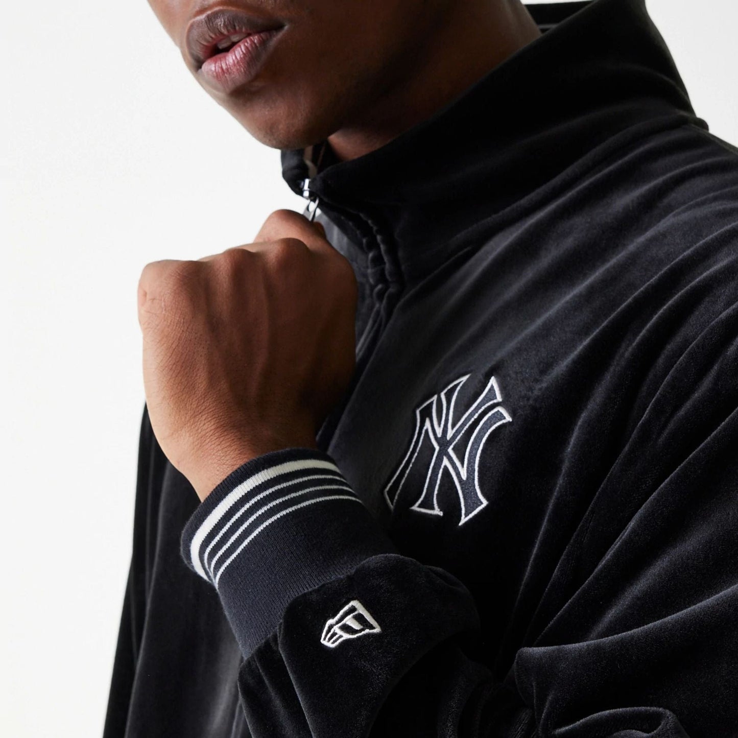The Male model is wearing New York Yankees MLB Velour Black Track Top 7