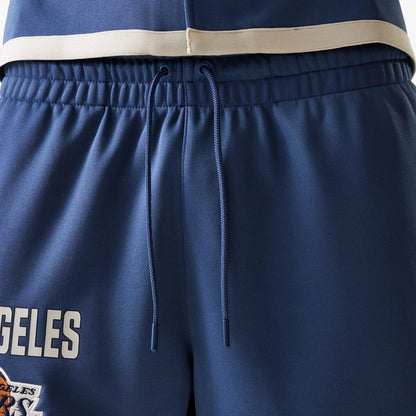 The Male model is wearing LA Lakers NBA Snap Button Dark Blue Shorts 6