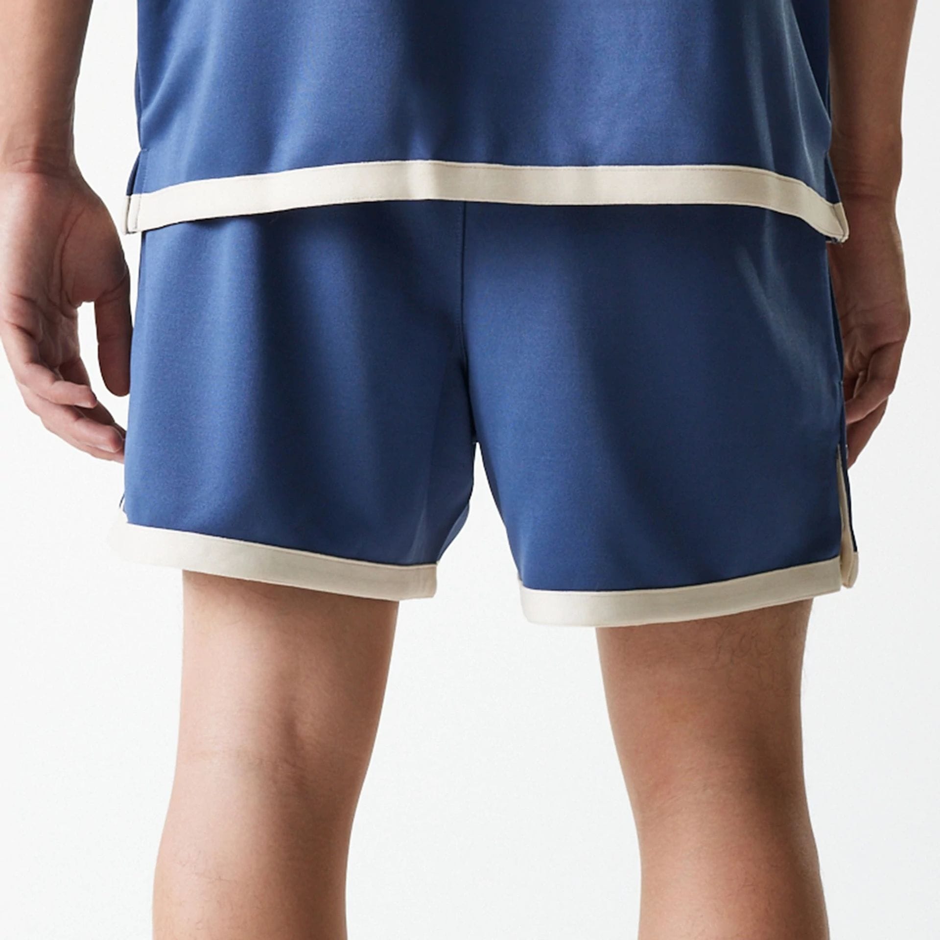 The Male model is wearing LA Lakers NBA Snap Button Dark Blue Shorts 7