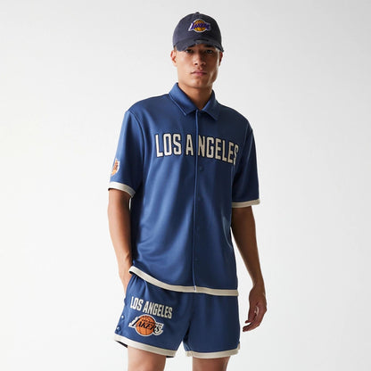 The Male model is wearing LA Lakers NBA Snap Button Dark Blue Short Sleeve Shirt 3