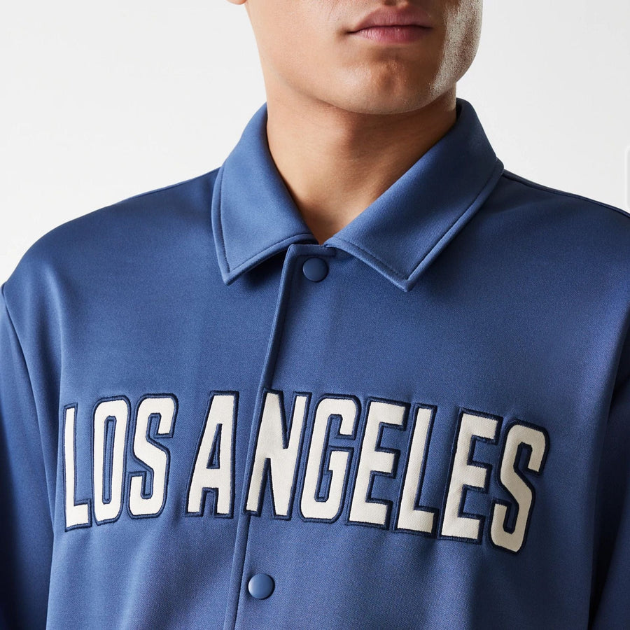 The Male model is wearing LA Lakers NBA Snap Button Dark Blue Short Sleeve Shirt 4