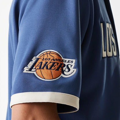 The Male model is wearing LA Lakers NBA Snap Button Dark Blue Short Sleeve Shirt 6