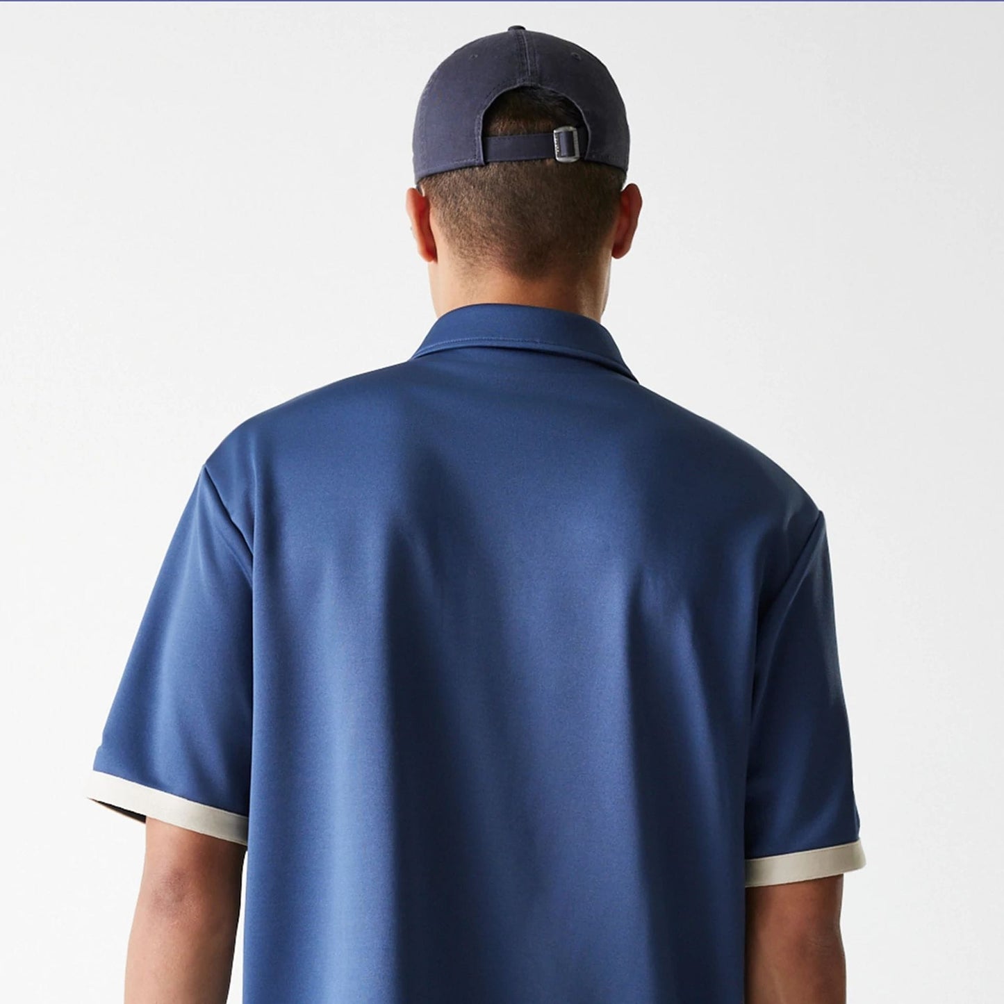 The Male model is wearing LA Lakers NBA Snap Button Dark Blue Short Sleeve Shirt 7