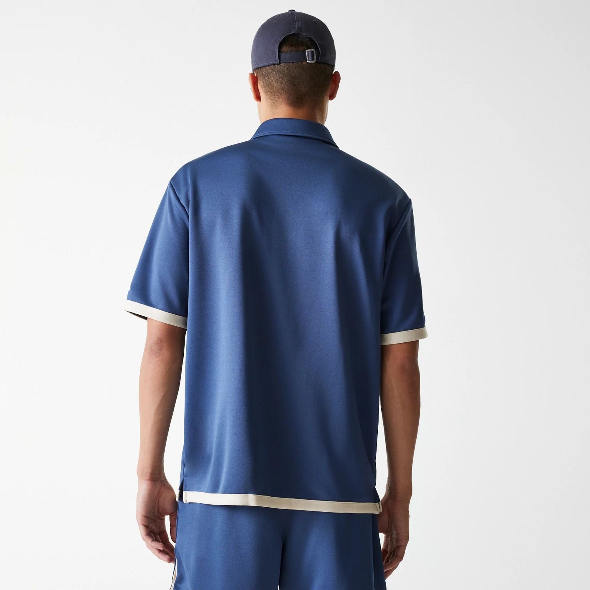 The Male model is wearing LA Lakers NBA Snap Button Dark Blue Short Sleeve Shirt 2