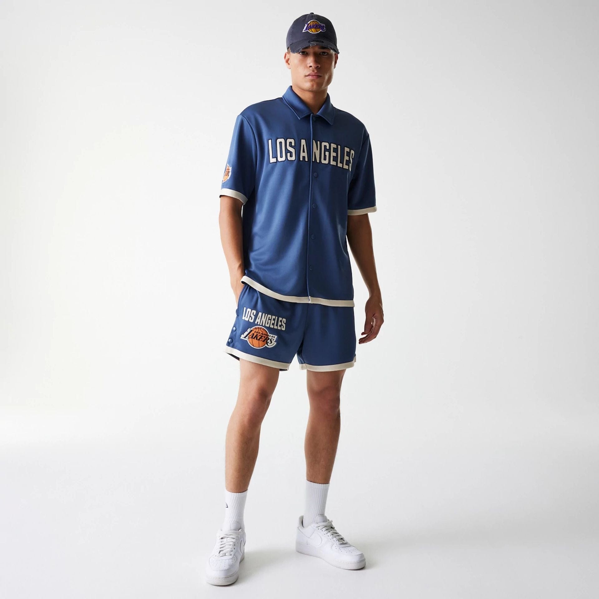 The Male model is wearing LA Lakers NBA Snap Button Dark Blue Short Sleeve Shirt 8
