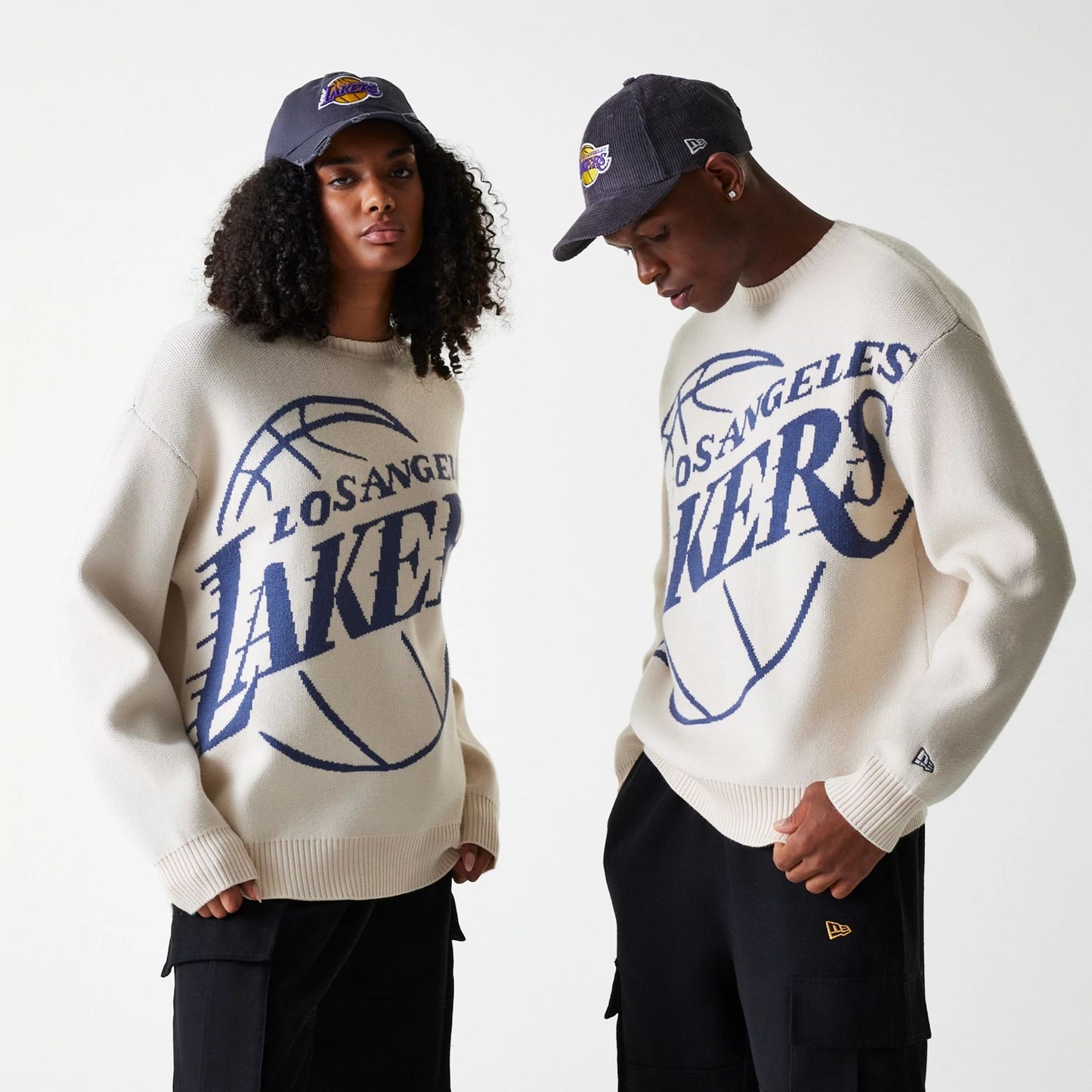 The Male model is wearing LA Lakers NBA Knit Light Beige Oversized Knit Sweater 1