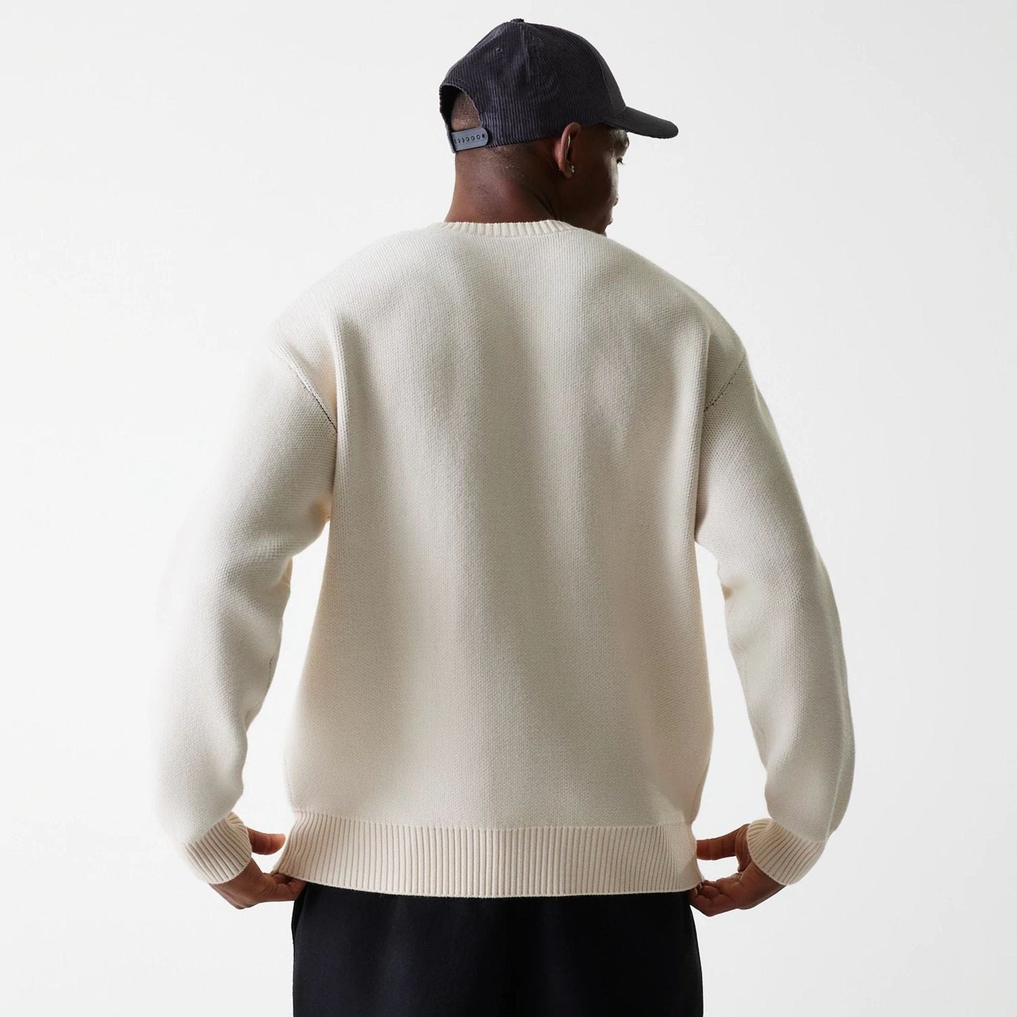 The Male model is wearing LA Lakers NBA Knit Light Beige Oversized Knit Sweater 3