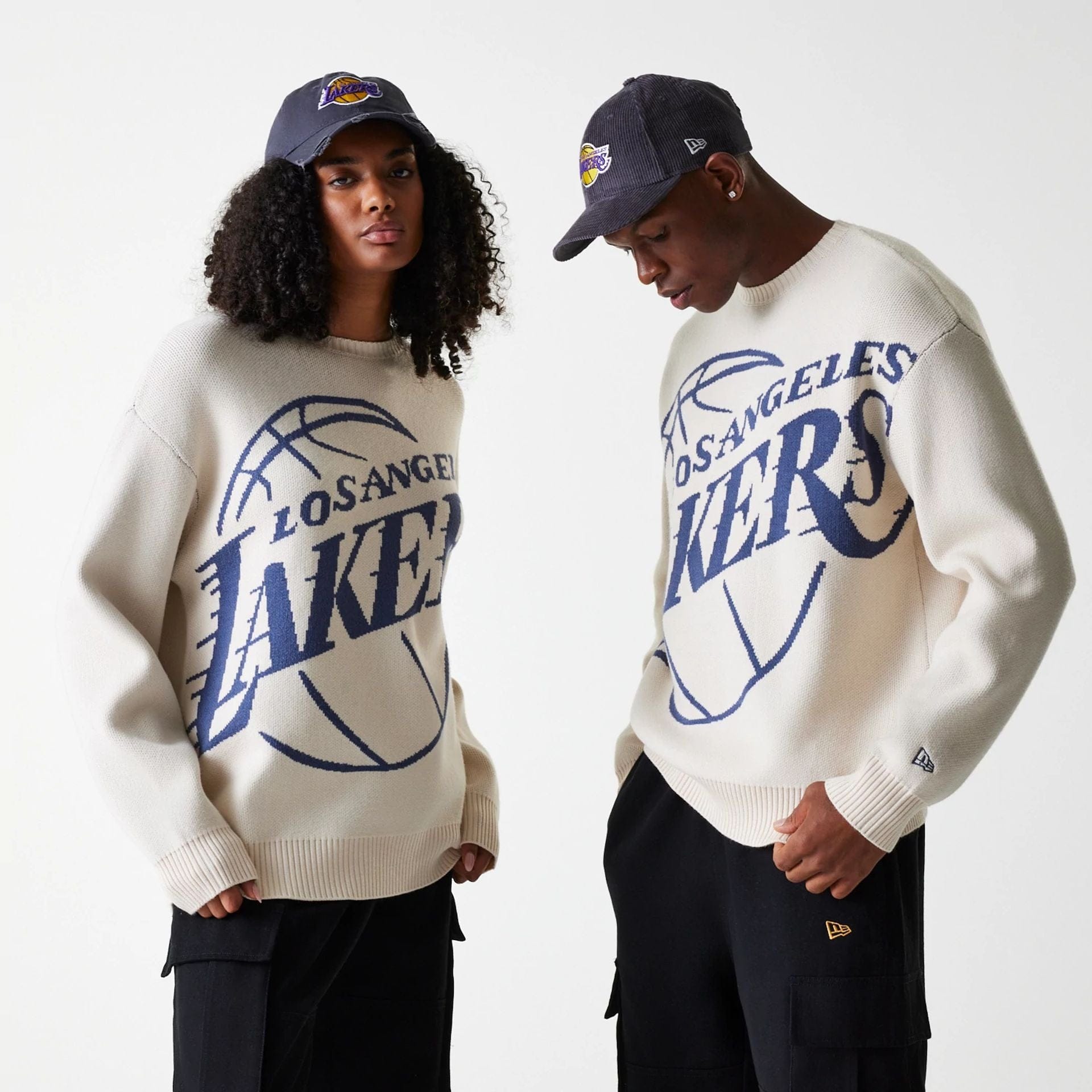The Male model is wearing LA Lakers NBA Knit Light Beige Oversized Knit Sweater 1