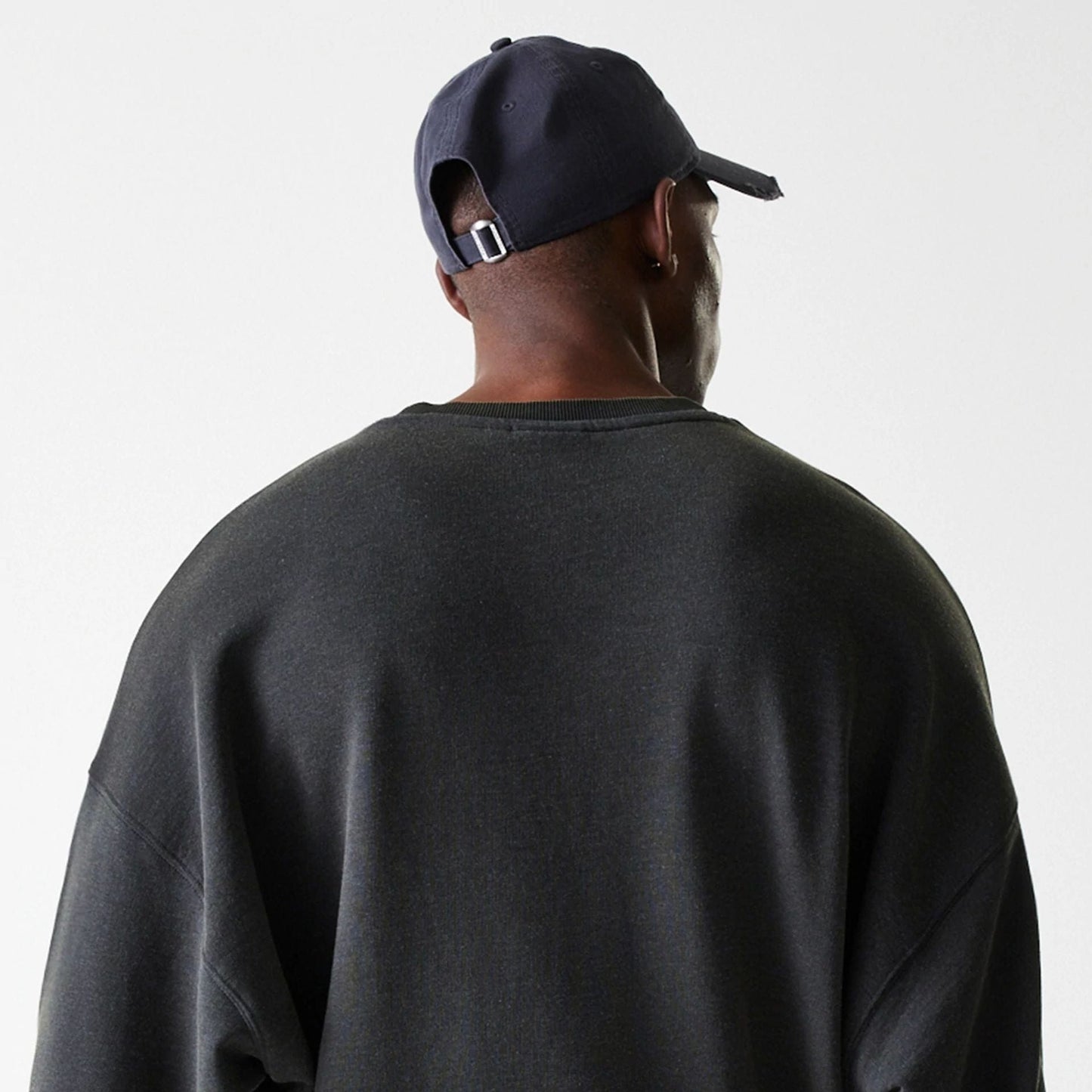 The Male model is wearing LA Lakers NBA Washed Graphic Grey Oversized Crew Neck Sweater 8