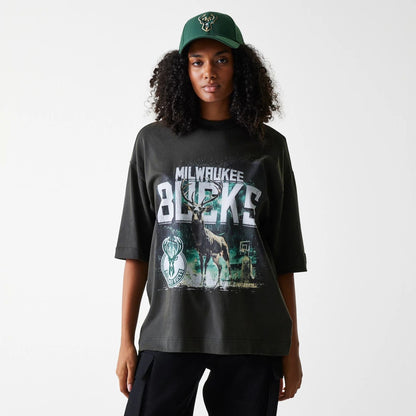 The Male model is wearing Milwaukee Bucks NBA Washed Graphic Grey T-Shirt 4
